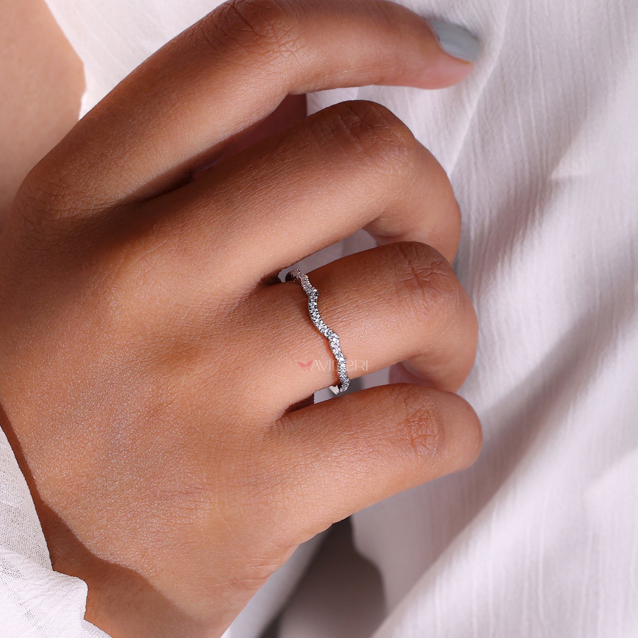 Handmade jewelry featuring unique diamond designs.
