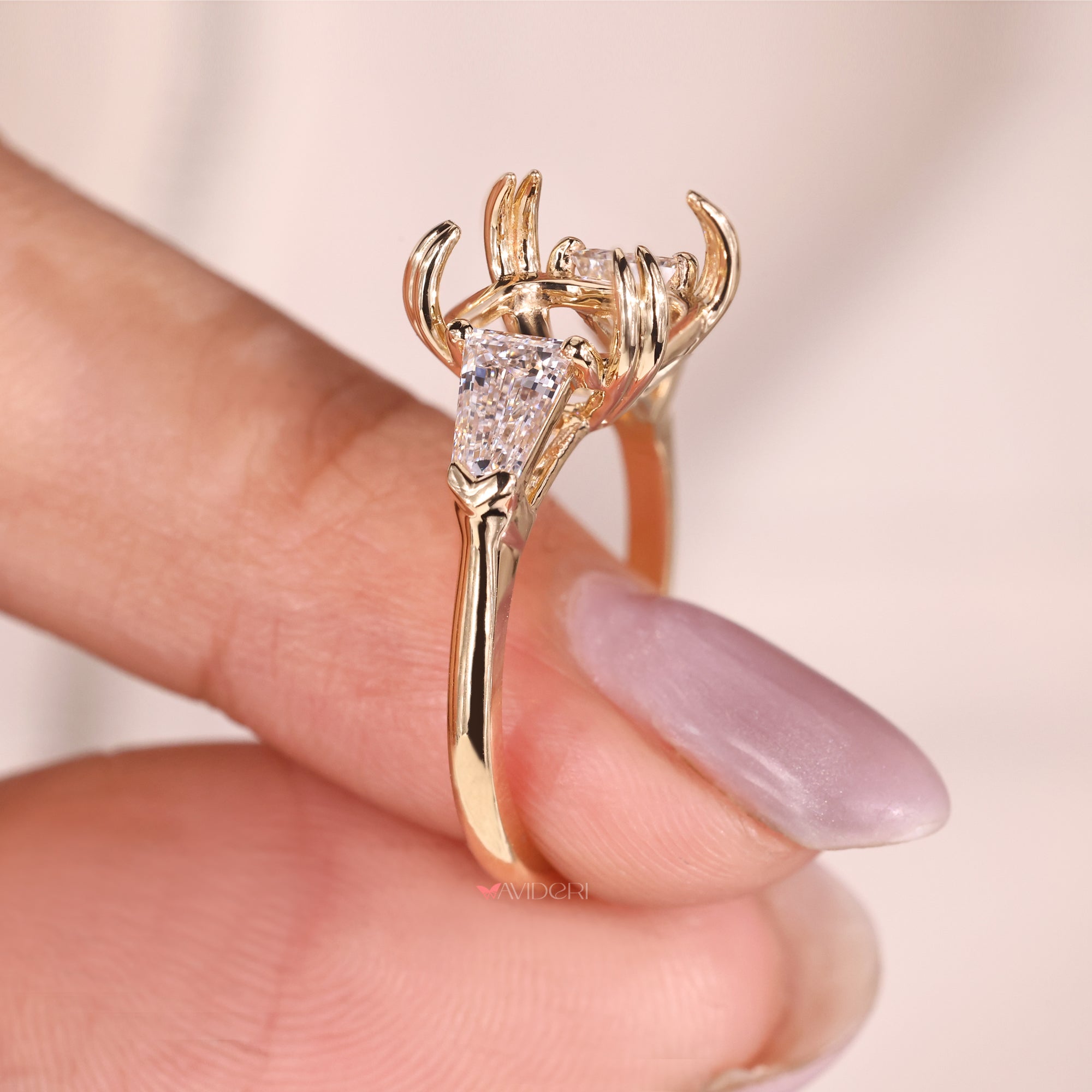 Custom diamond ring with double claw prongs.
