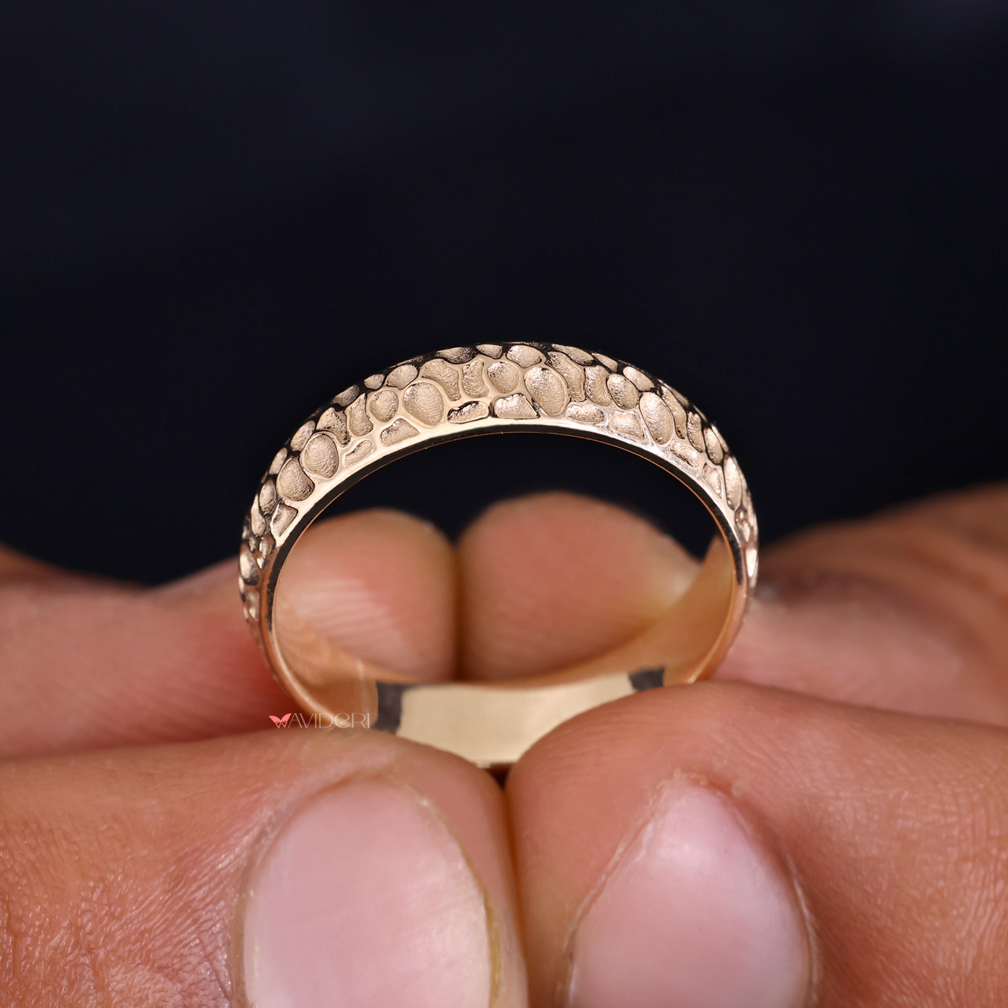 Unique man wedding band makes bold statement with personal touch.
