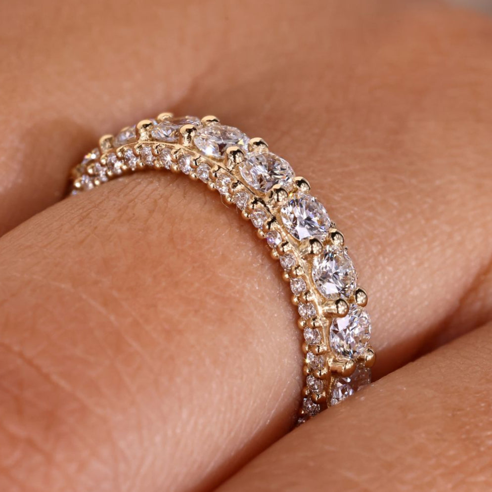 Three side eternity band with round diamonds for a sparkling finish.
