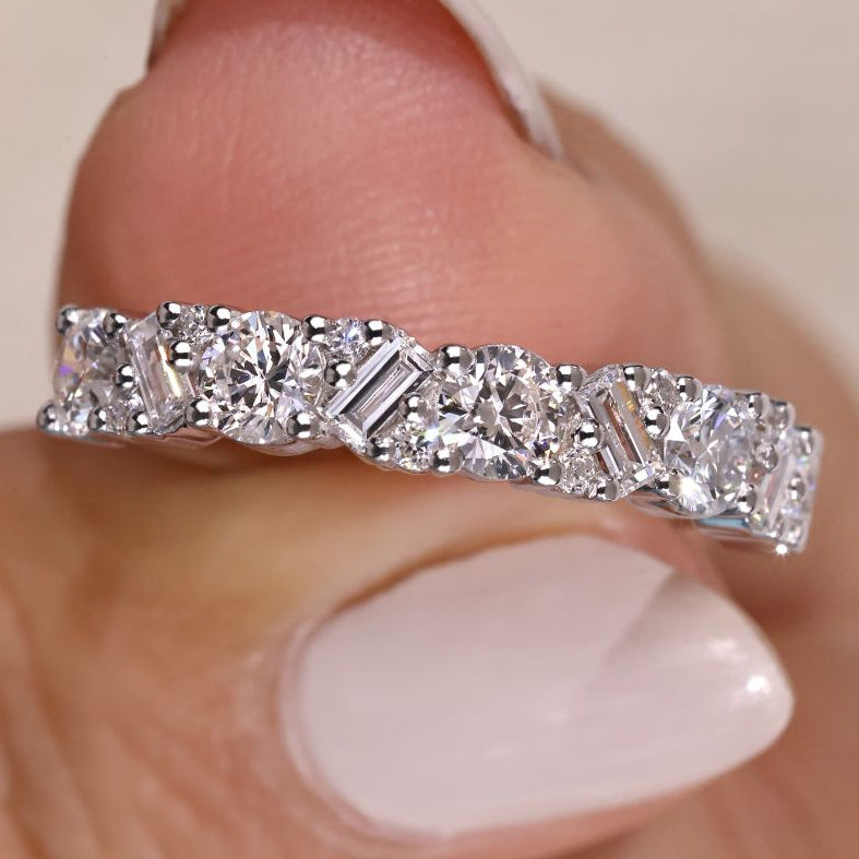 Baguette and round wedding band in white gold setting.
