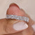 Baguette and round wedding band in white gold setting.
