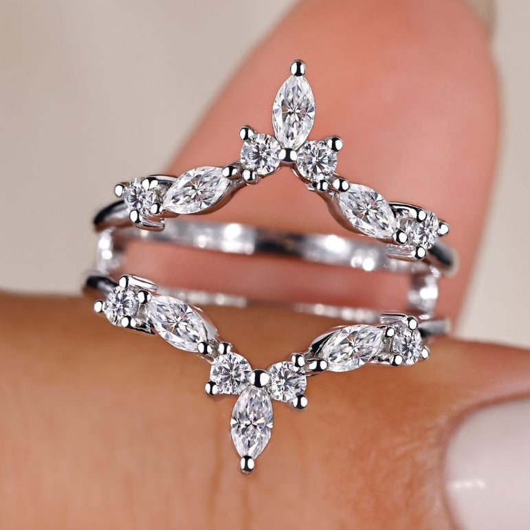 Wrap guard wedding band with unique design.
