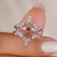 Wrap guard wedding band with unique design.
