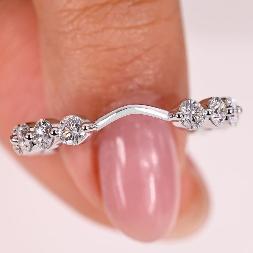 Round diamond wedding band with a sleek design.
