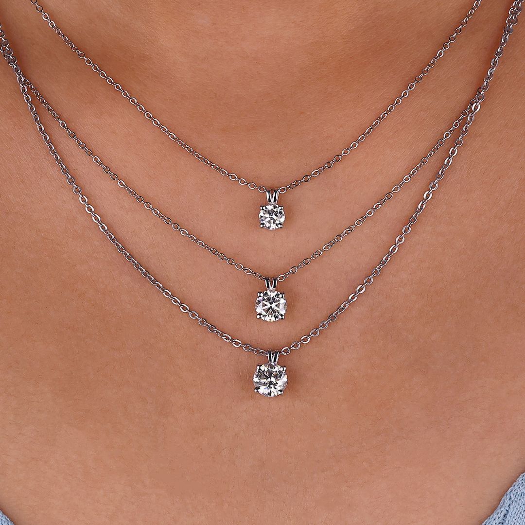 Round brilliant cut pendant featuring a minimalist design perfect for everyday wear.