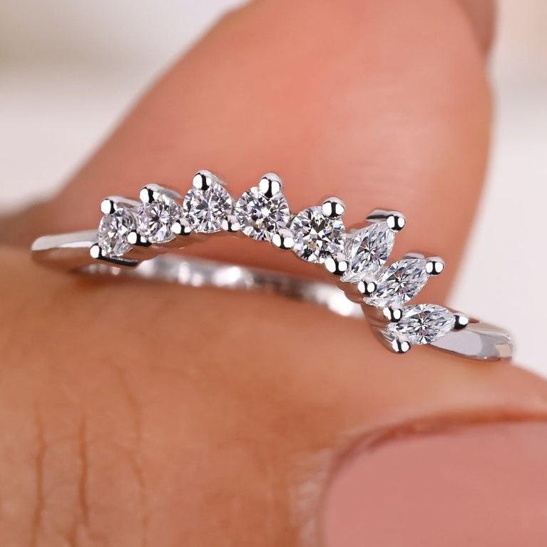 Tiara wedding band with a unique crown design.
