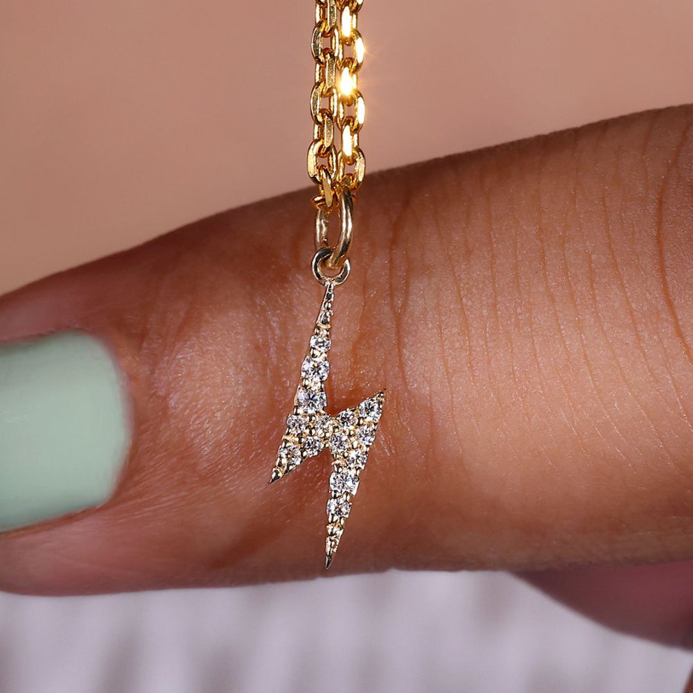 Lightning bolt pendant with a sleek, edgy design.