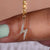 Lightning bolt pendant with a sleek, edgy design.