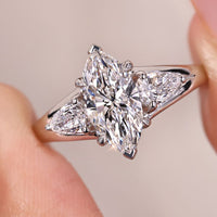 Marquise Diamond Ring With Pear Side Stone