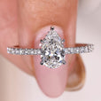 Pear Cut Engagement Ring with a pear-shaped diamond in white gold.
