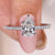 Pear Cut Engagement Ring with a pear-shaped diamond in white gold.
