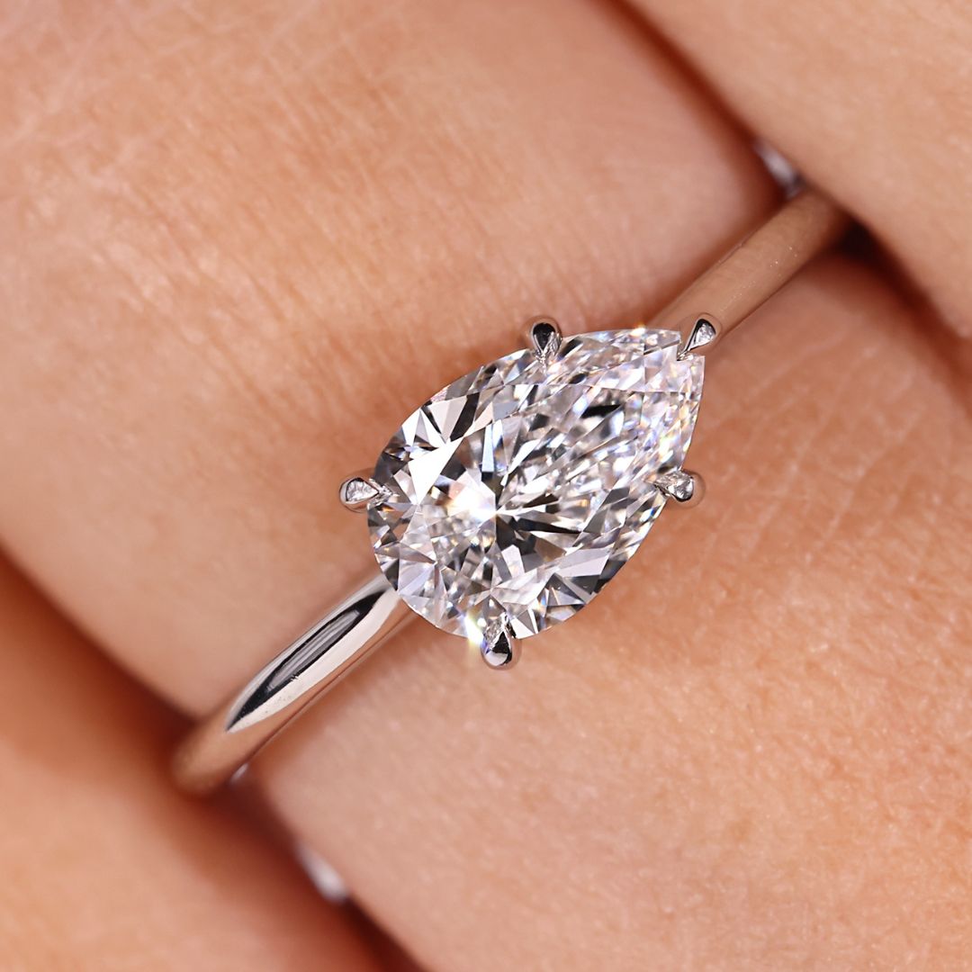 Pear Cut Diamond Ring set in a sleek white gold band.