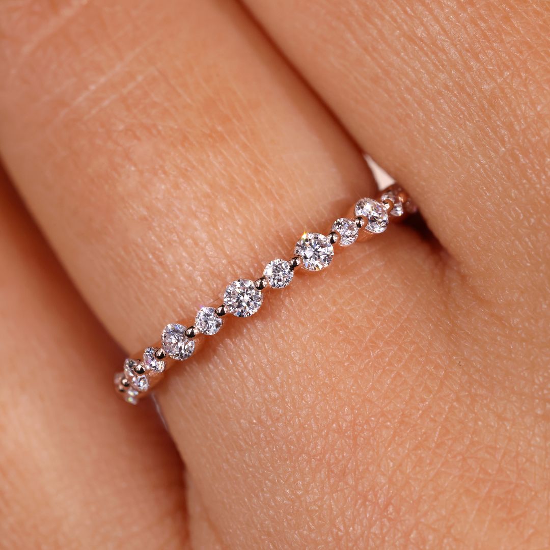 Round diamond eternity band set in a beautiful round diamond wedding band.

