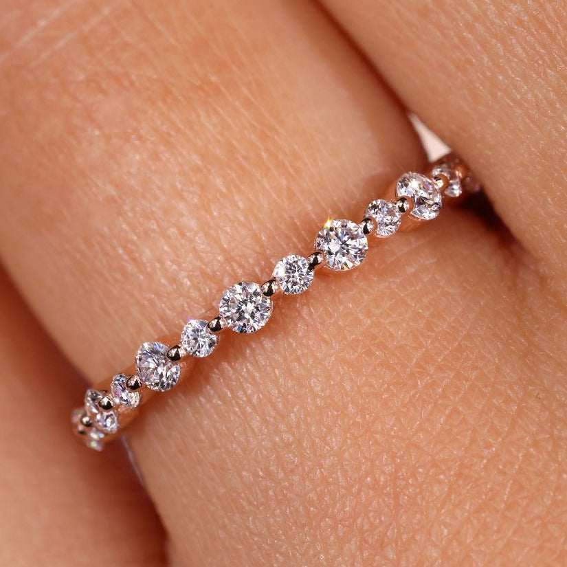Round diamond eternity band set in a beautiful round diamond wedding band.
