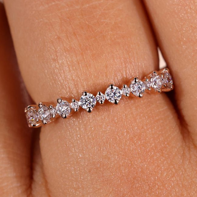 Half eternity band with sparkling diamonds.

