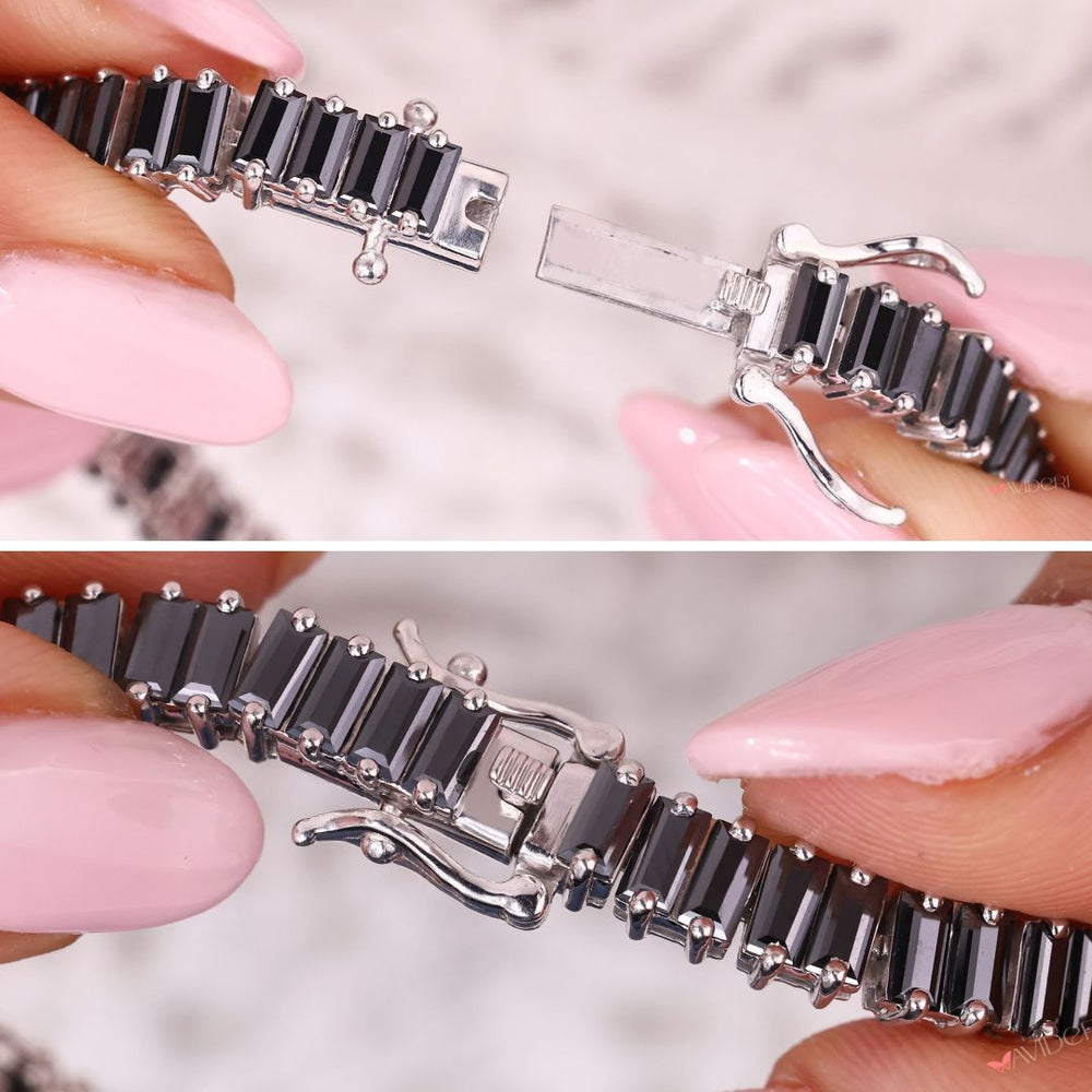 Baguette cut tennis bracelet with prong setting.