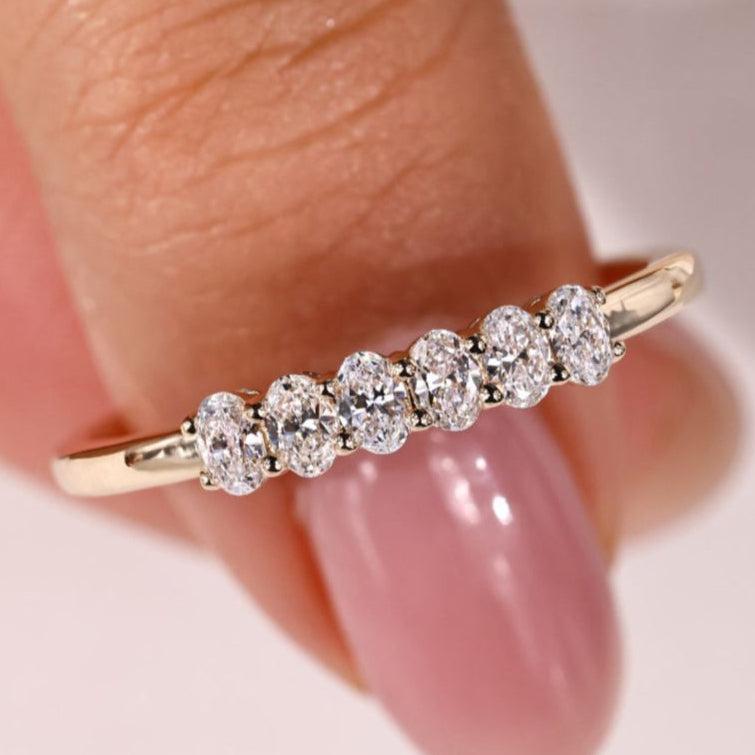 6 stone wedding band with sparkling diamonds.
