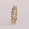 Elegant shared prong wedding band with a timeless design for lasting beauty.
