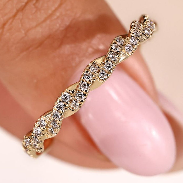 Round diamond wedding band featuring timeless sparkle and elegance.
