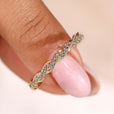 Round diamond wedding band featuring timeless sparkle and elegance.
