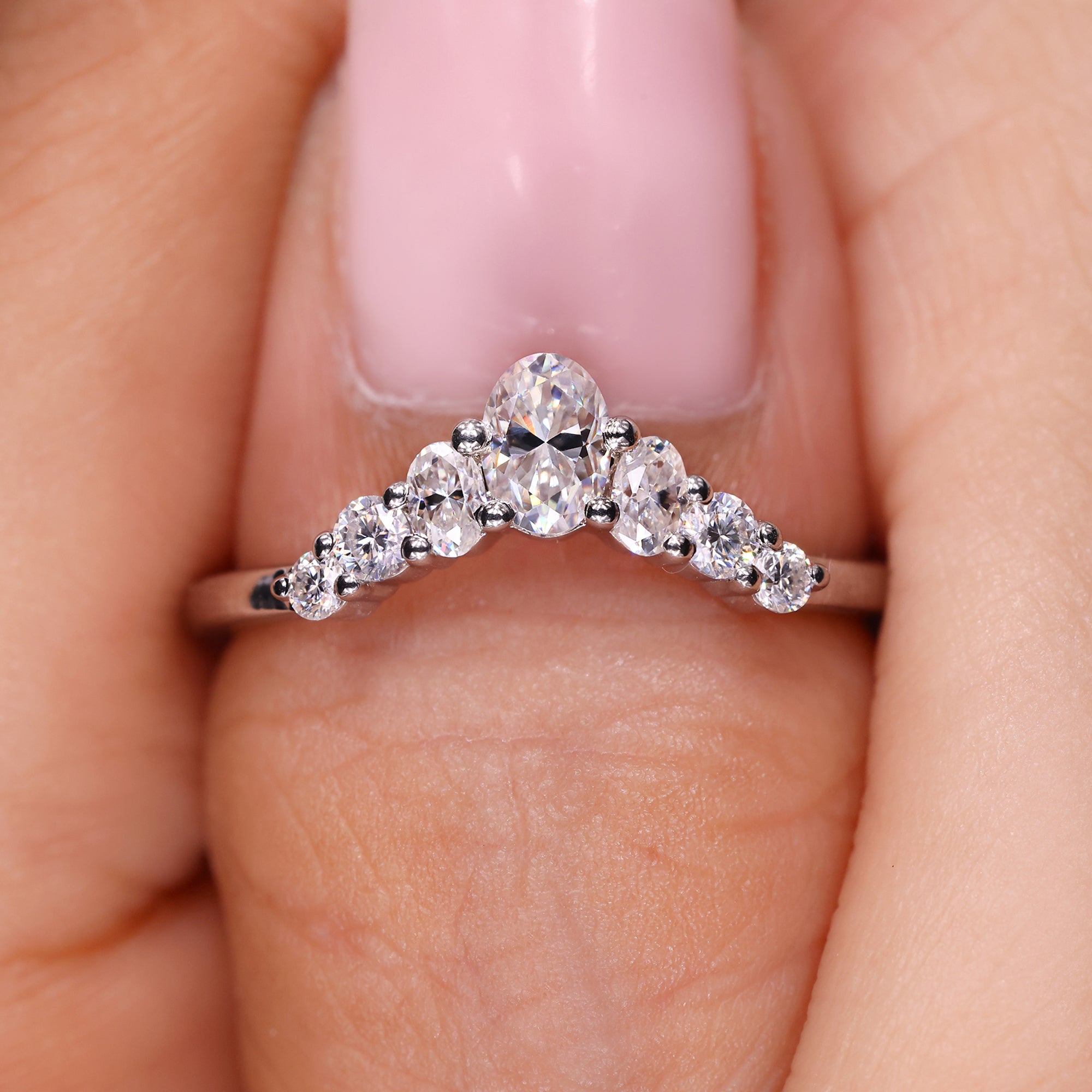Shared prong wedding band with white gold band.