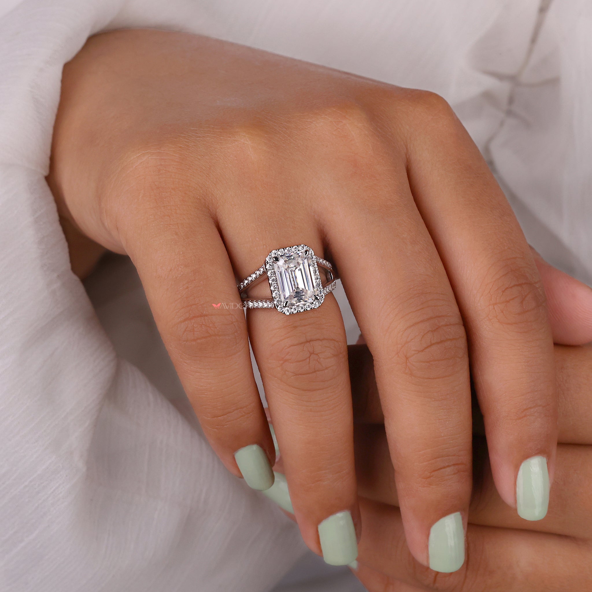 Claw prong ring setting offering secure and stylish support for the center stone.
