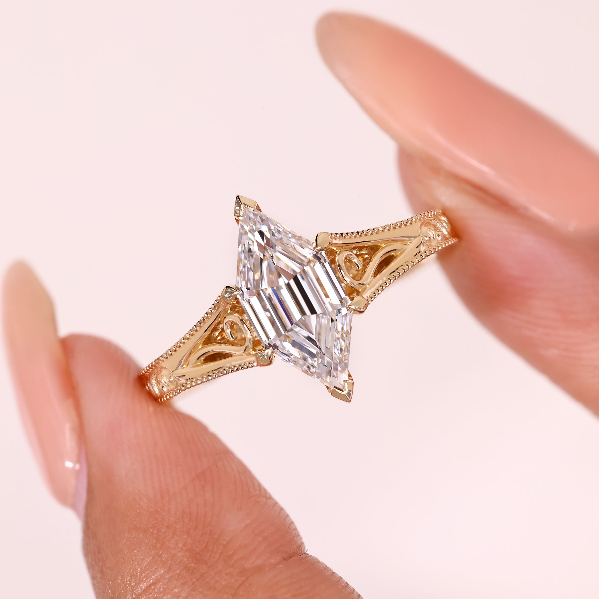 Hexagon diamond ring with milgrain detail.
