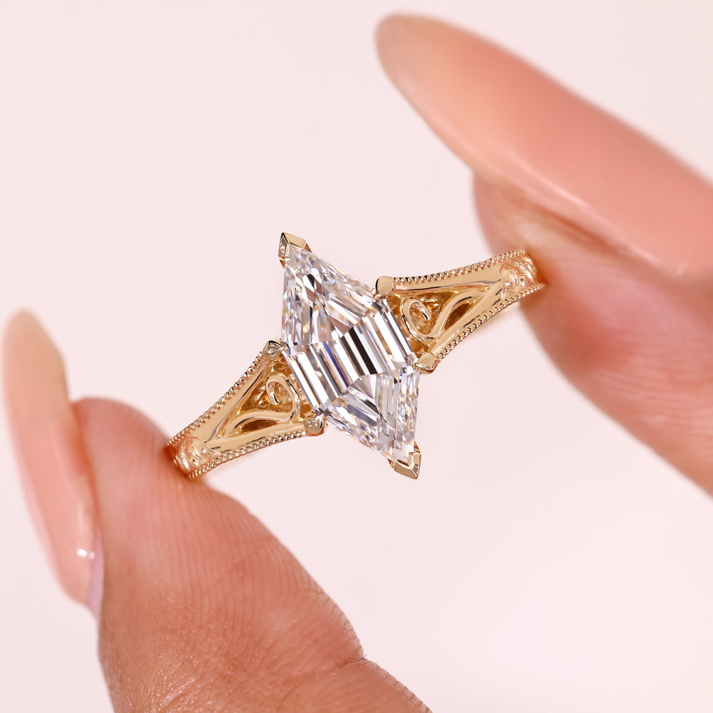 Hexagon diamond ring with milgrain detail.
