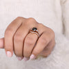 Black moissanite ring set in a pear shape ring for a bold statement.