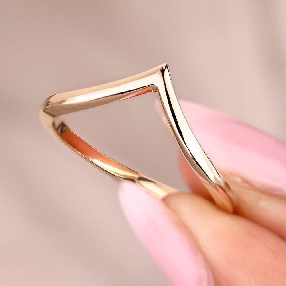 Chevron wedding band in v shaped style.