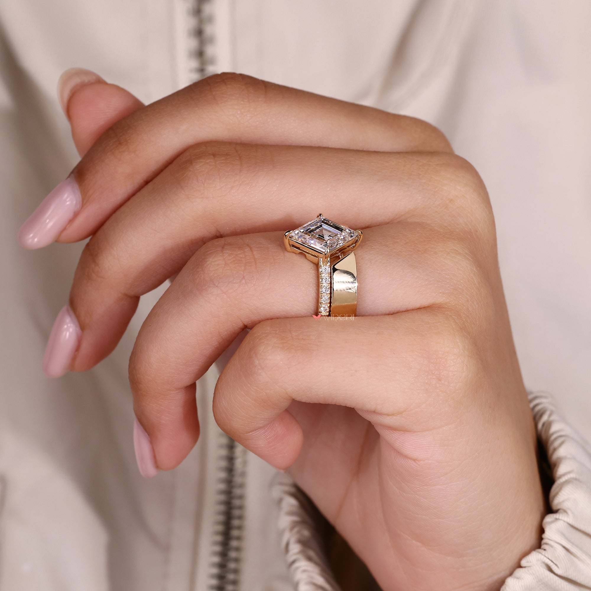 Lozenge diamond ring with cathedral setting and band.
