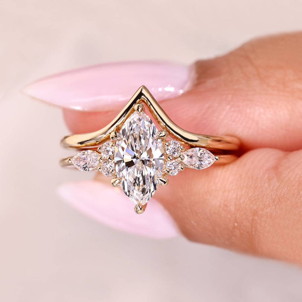 Chevron wedding band with marquise diamond ring.
