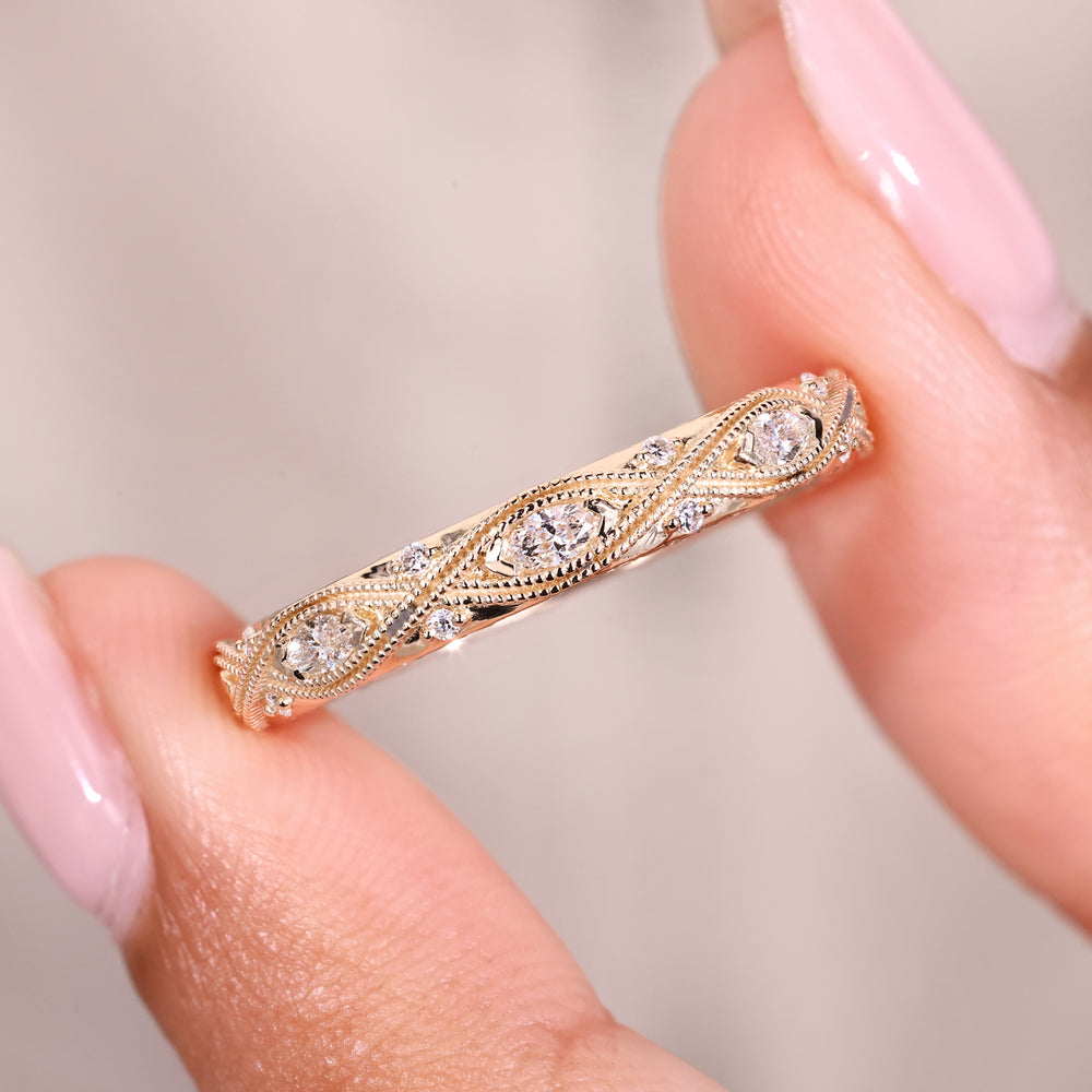 Marquise round diamond wedding band style.

