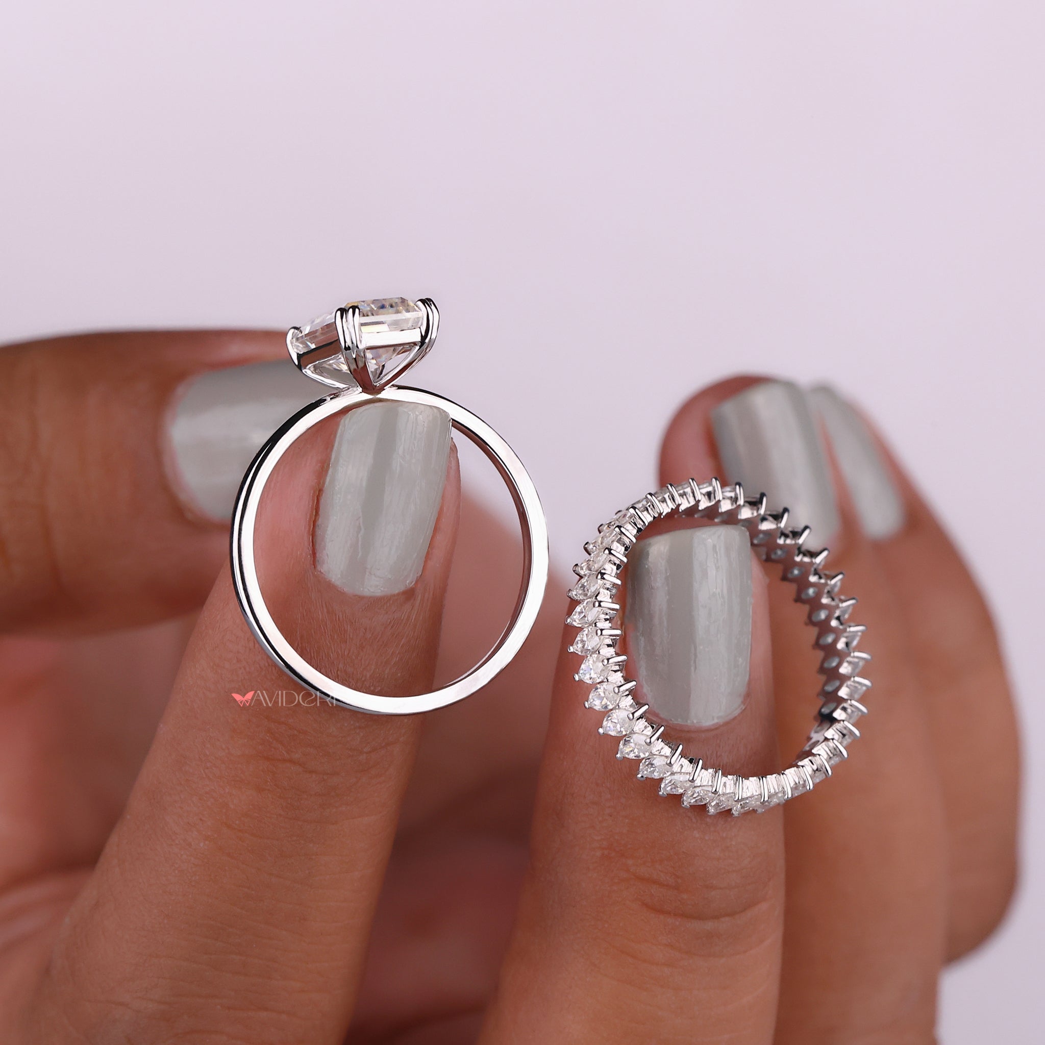 Solitaire Setting enhances the elegance of the Emerald Cut Engagement Ring.