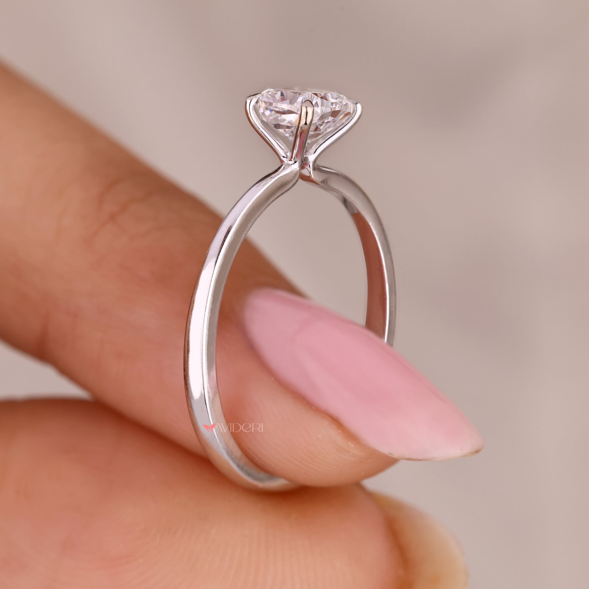 Lab grown cushion cut diamond solitaire ring.