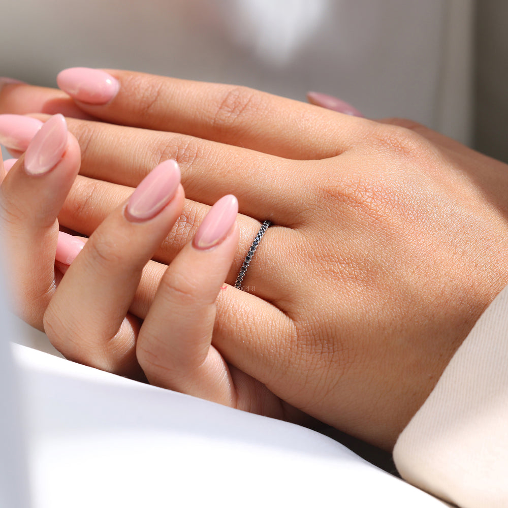 Round eternity band set in a White gold wedding band for elegance.