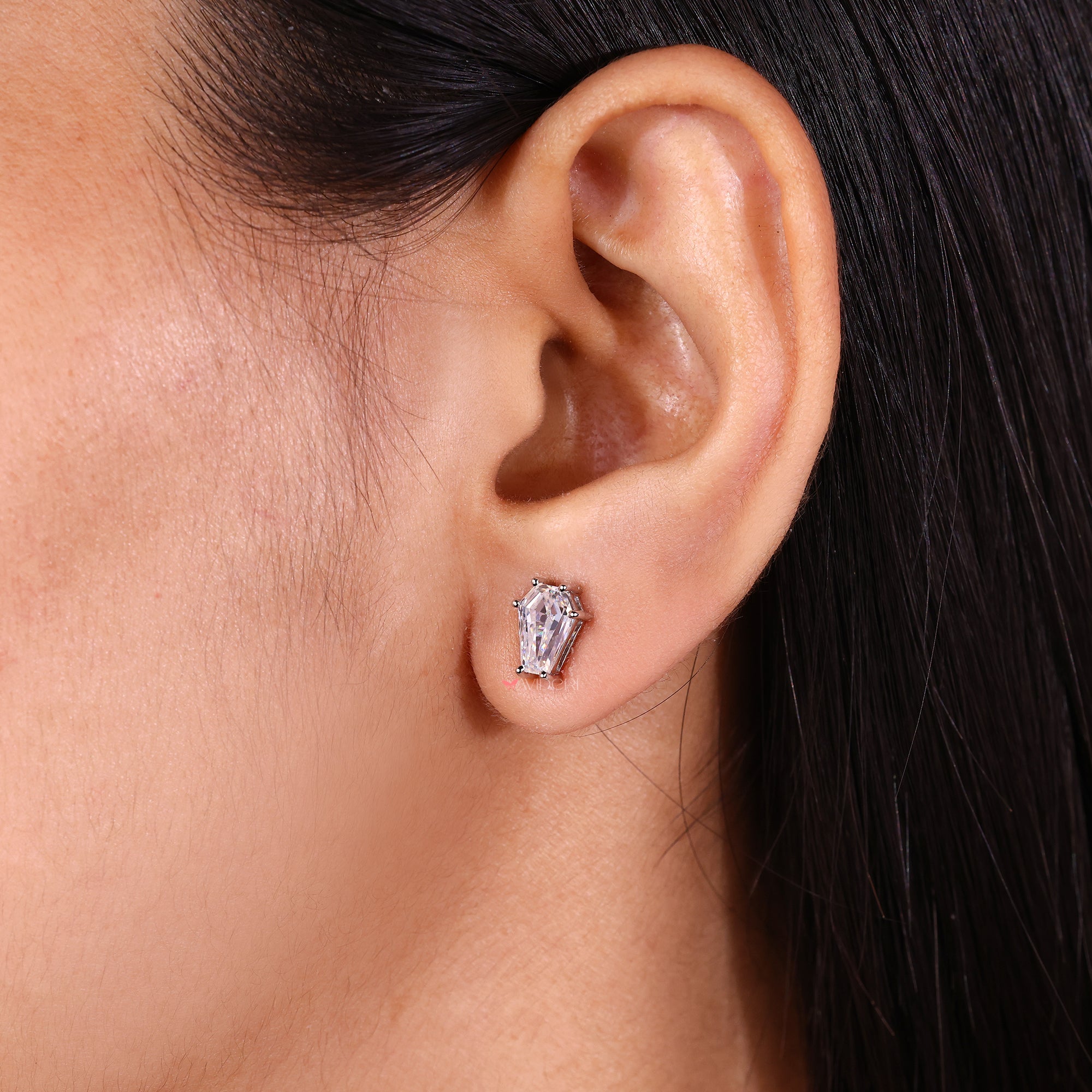 Prong settings earrings featuring sparkling Coffin Cut Moissanite.