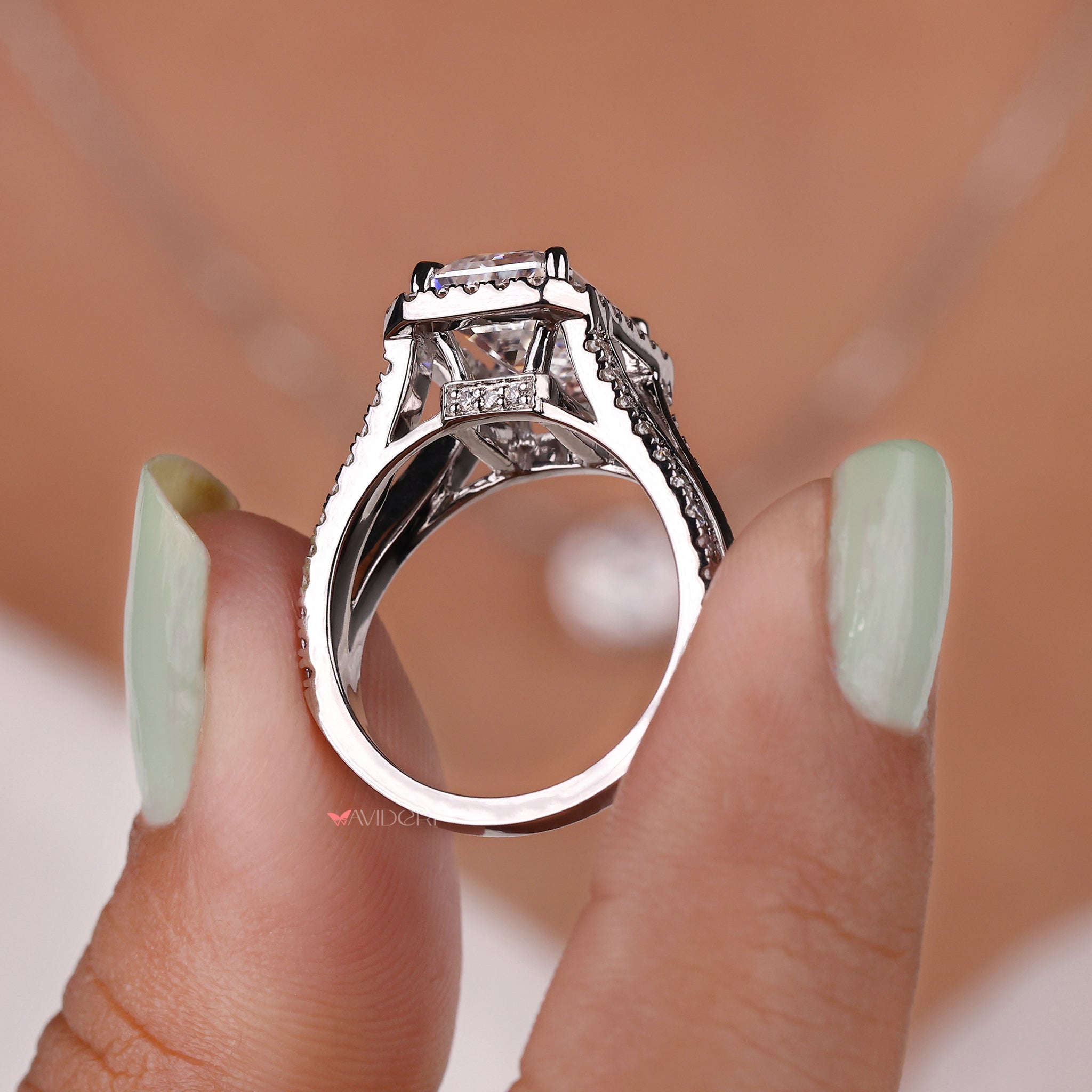 White gold ring designed with a refined finish and brilliant center stone.
