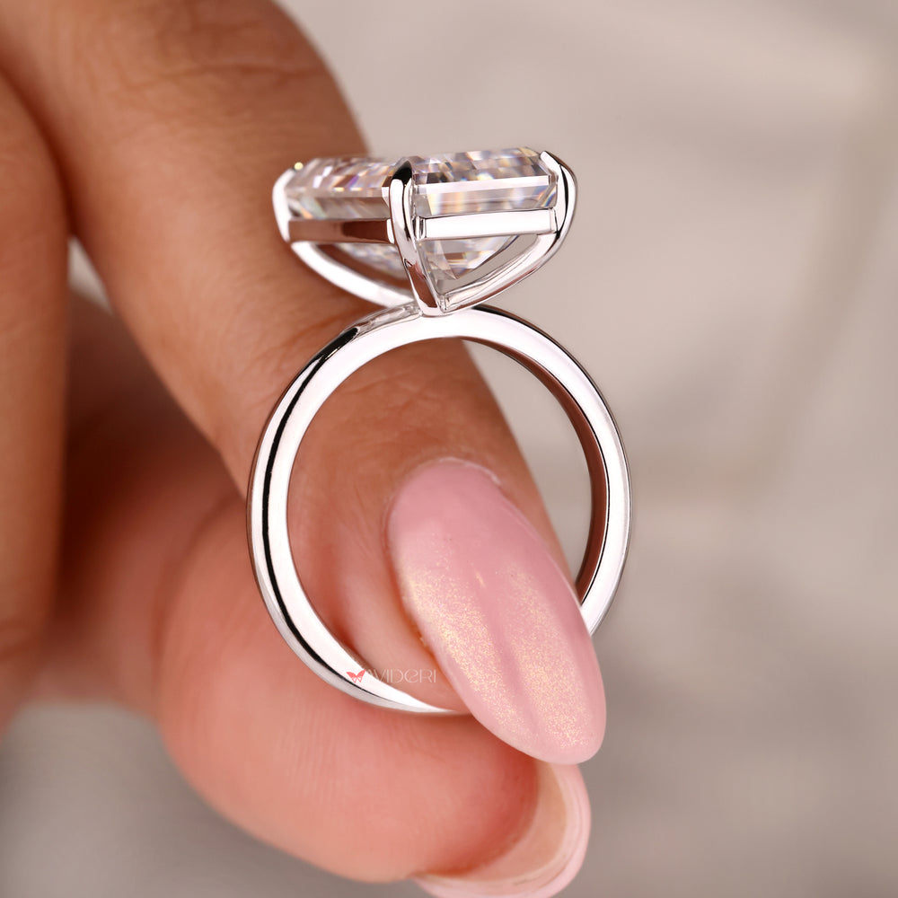 Long emerald cut ring set in a stunning white gold ring.
