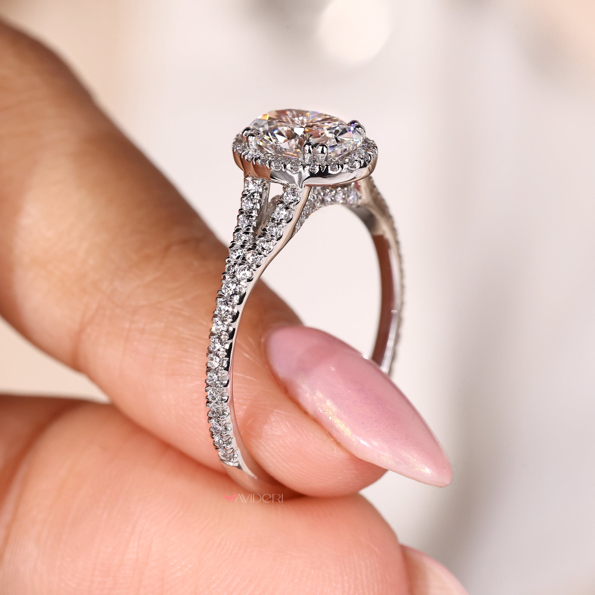 White gold engagement ring featuring an Oval diamond ring design.
