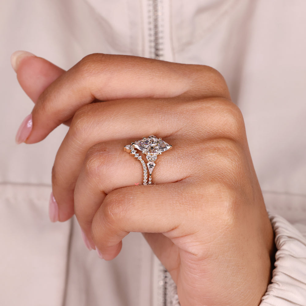 Six claw prong marquise diamond ring style.
