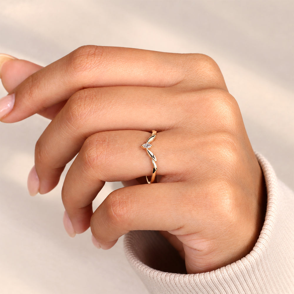 Lab grown marquise diamond band with V shaped design.

