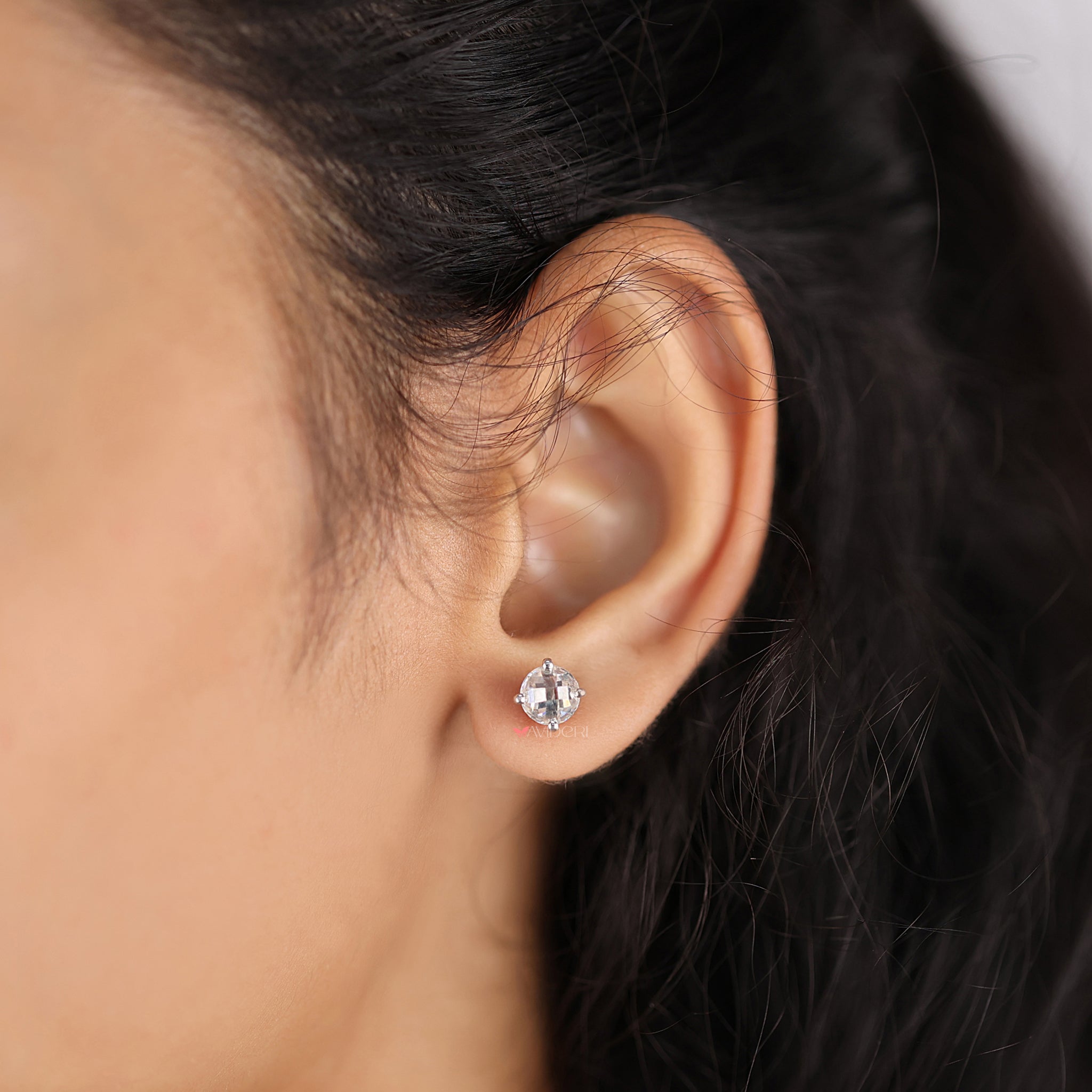 These stud earrings offer a clean and timeless look.