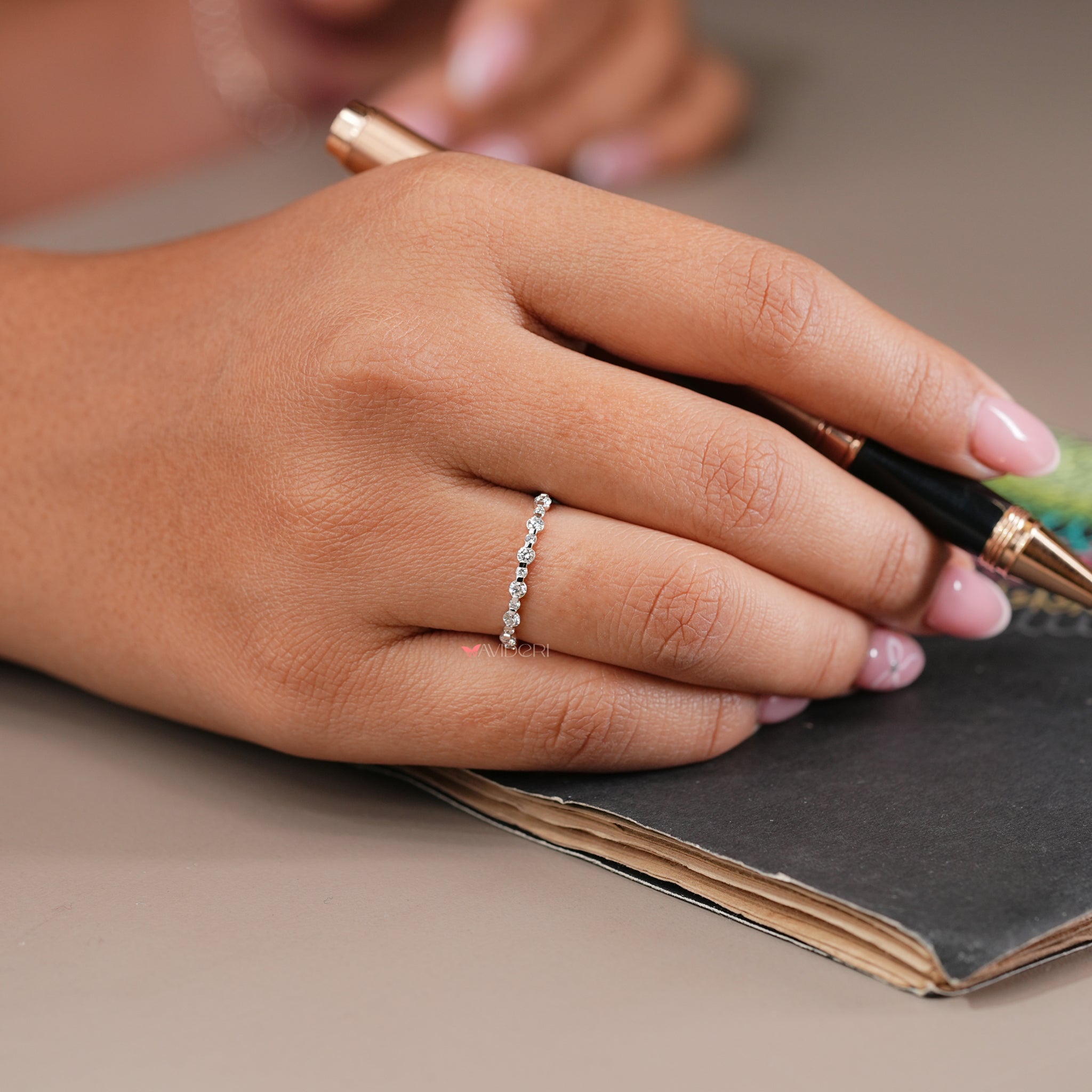Round cut diamond wedding band with a timeless design for your special moments.

