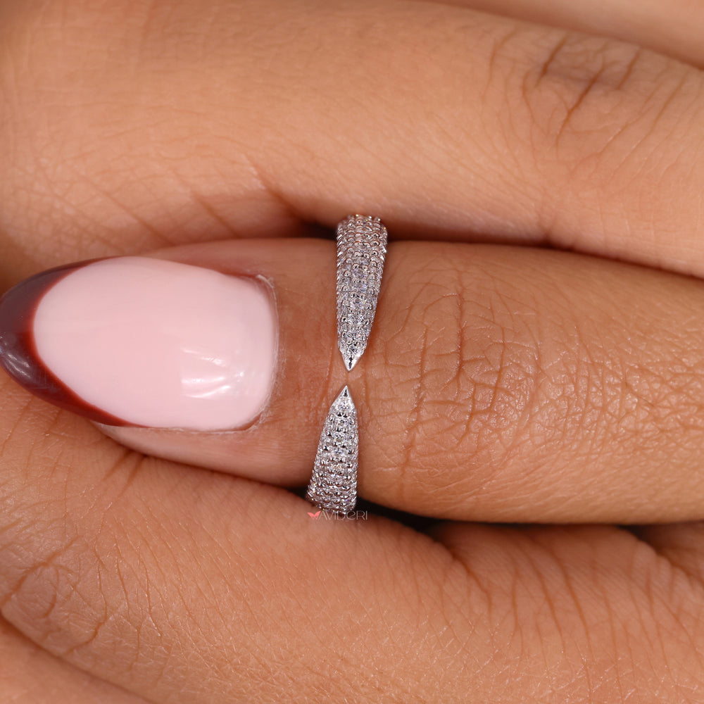 Handmade wedding band with open gap design.

