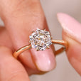 Solitaire engagement ring with hexagon step cut engagement ring.