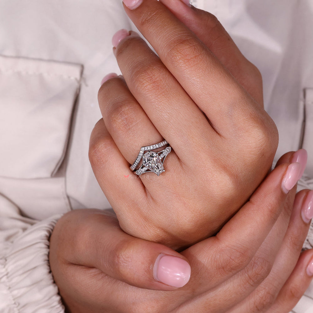Art deco engagement ring with curved wedding band in a matching bridal set.