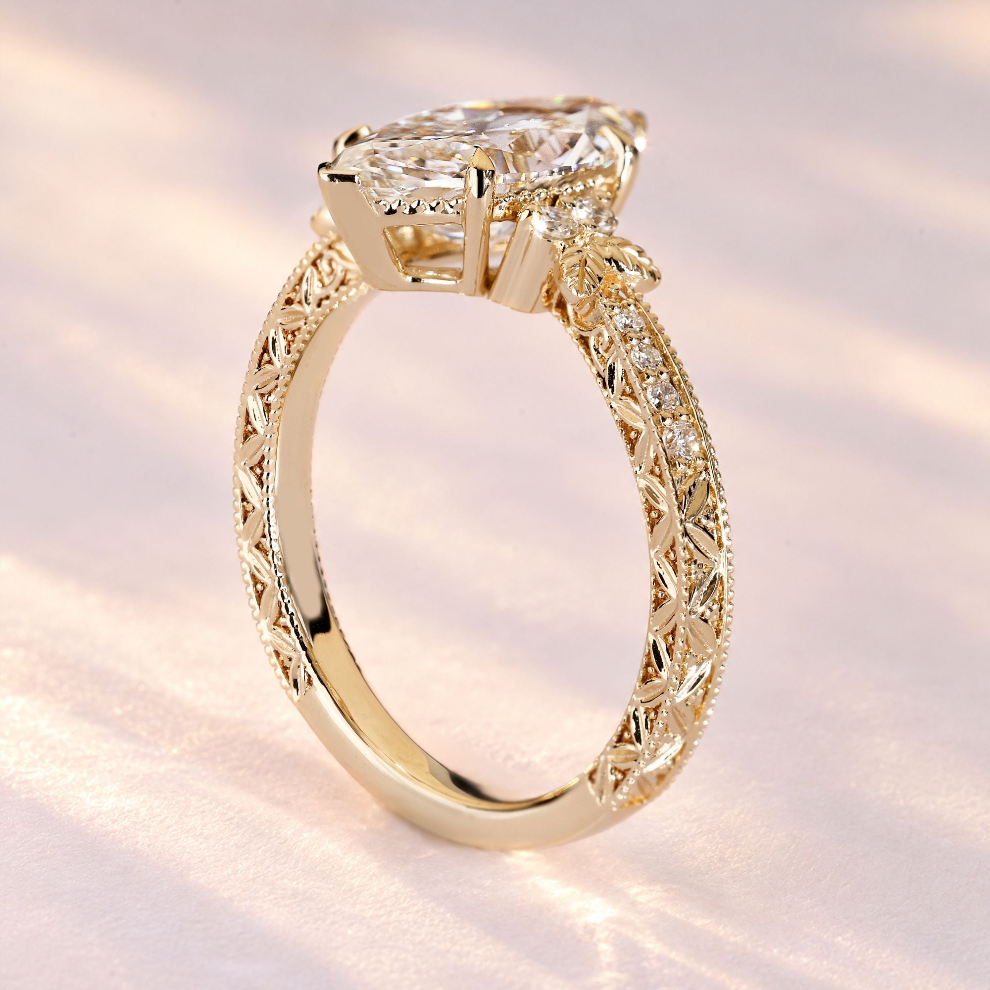 Lab grown marquise diamond ring with milgrain.
