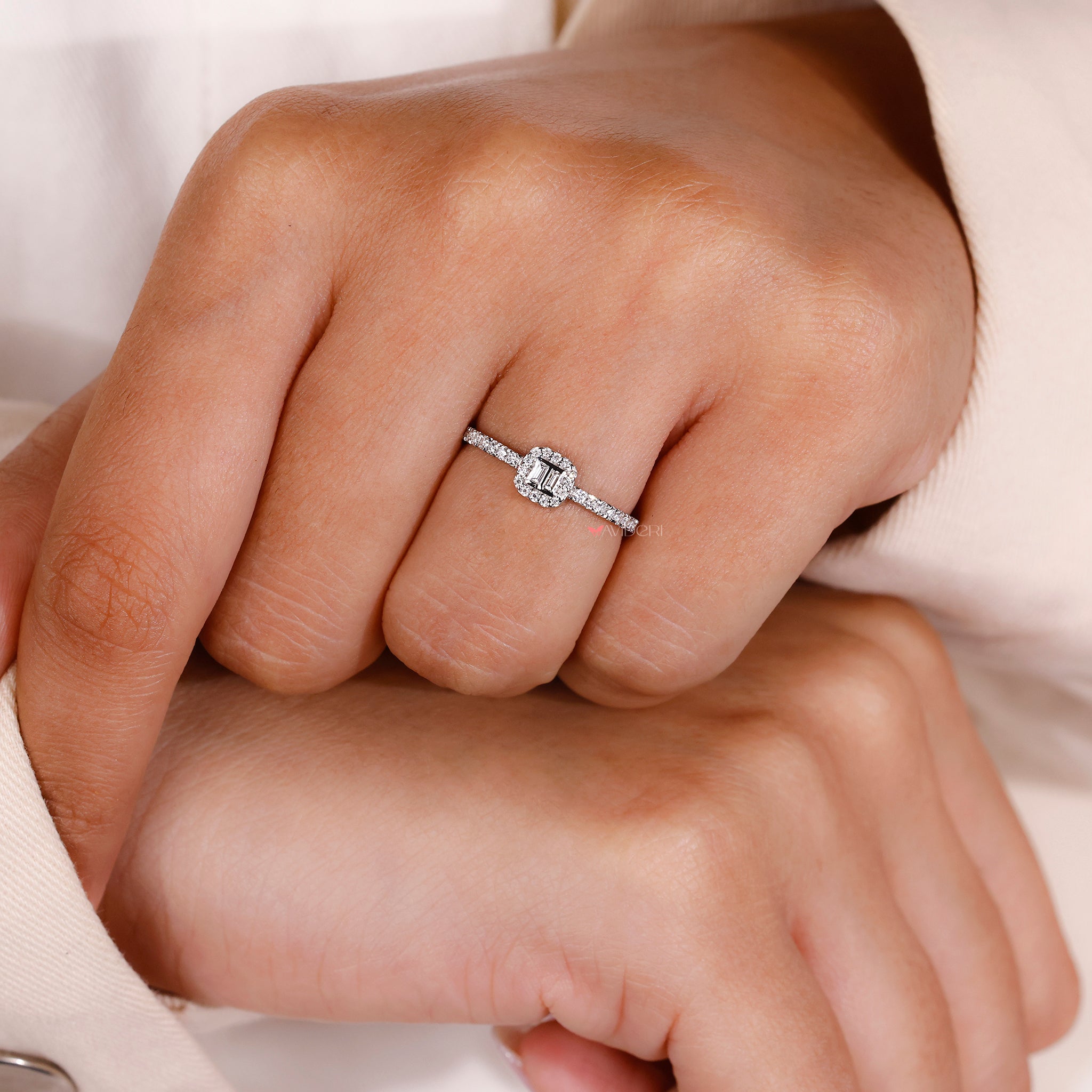 round cut halo setting engagement ring with pave band and lab grown diamond.